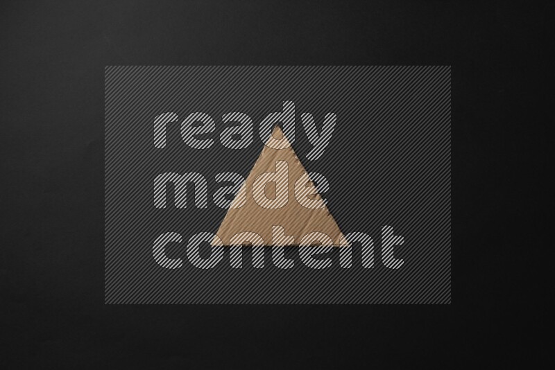 Cardboard in shapes on black background