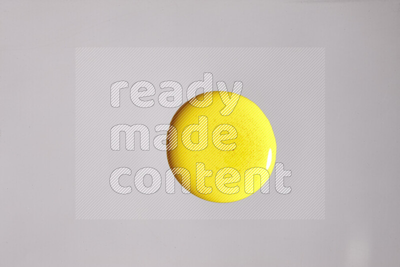 Close-ups of assorted colors blending on a grey background