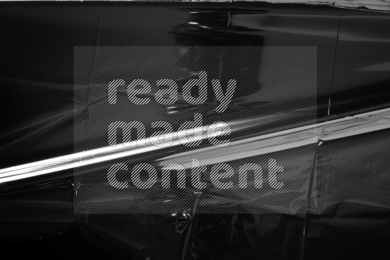 Plastic wrap texture on black background