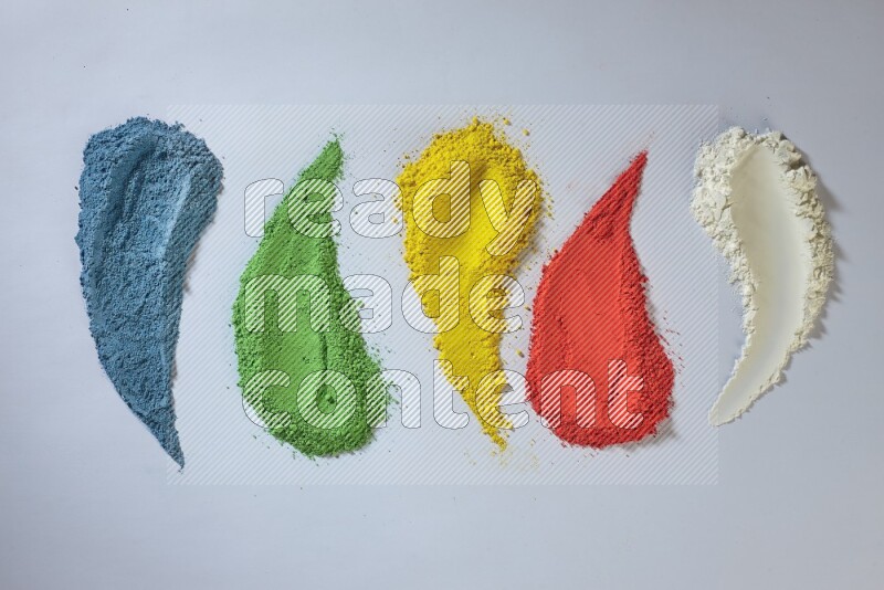 Multicolored powder smears on white background