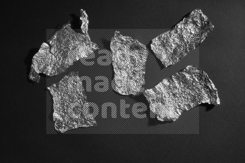 Aluminium foil on black background