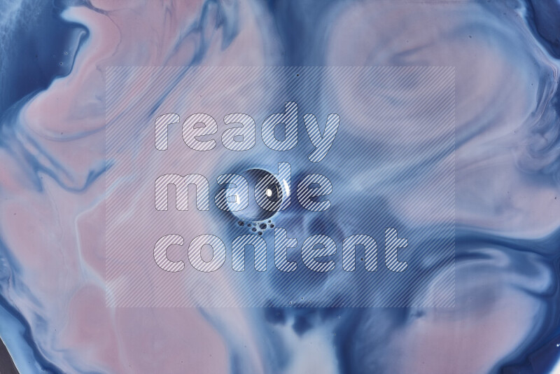 لقطة مقربة لأنماط دوامية باللون الأزرق والأحمر والأبيض