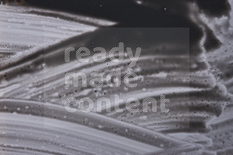 Close-ups of abstract black paint texture in different shapes