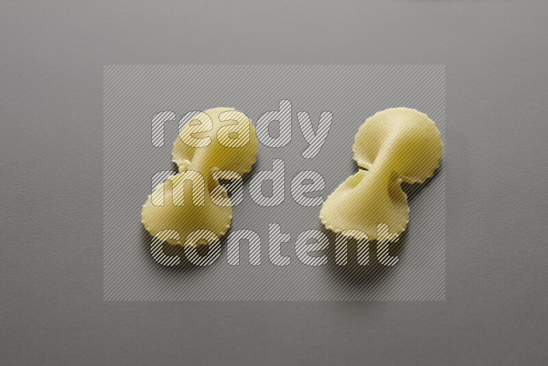Fiocchi pasta on grey background