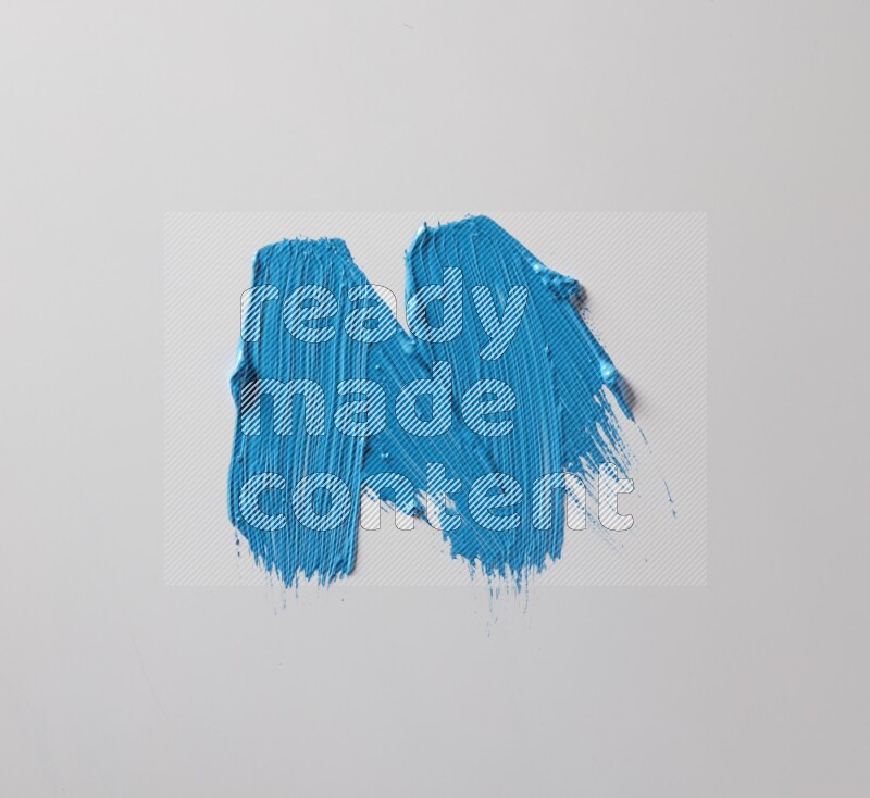 Multi blue straight brush strokes in different shapes on a white background