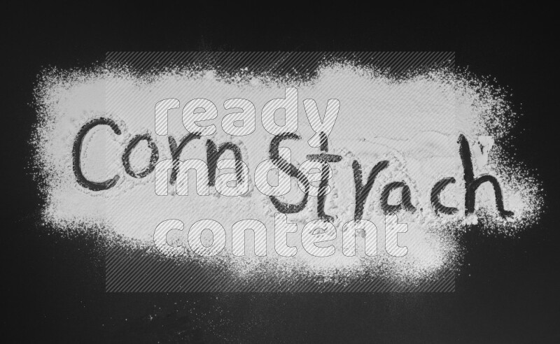 A sentence written with powder on black background