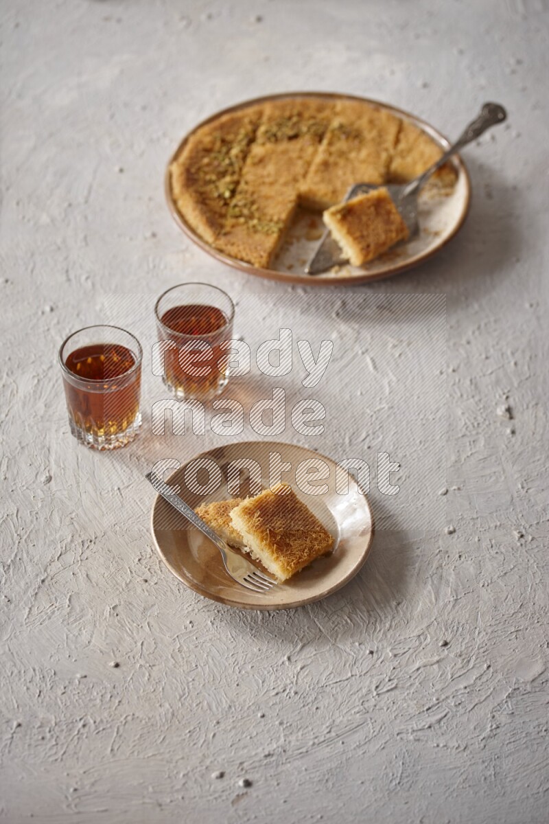 Konafa with tea in a light setup