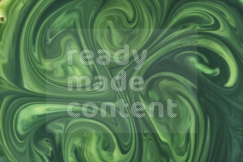 A close-up of abstract swirling patterns in green gradients