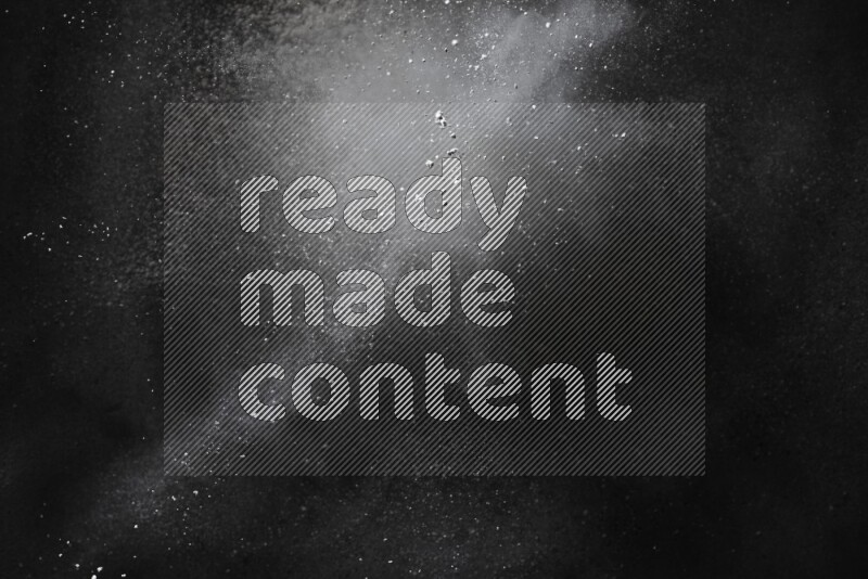 White powder explosion on black background
