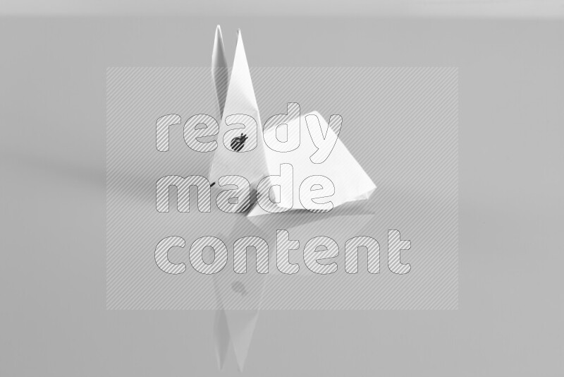 Origami animals on grey background
