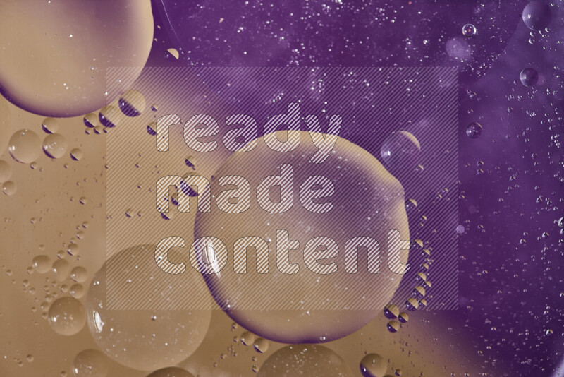 Close-ups of abstract oil bubbles on water surface in shades of purple and brown