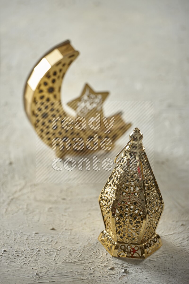 A crescent lantern with classic lantern on textured white background