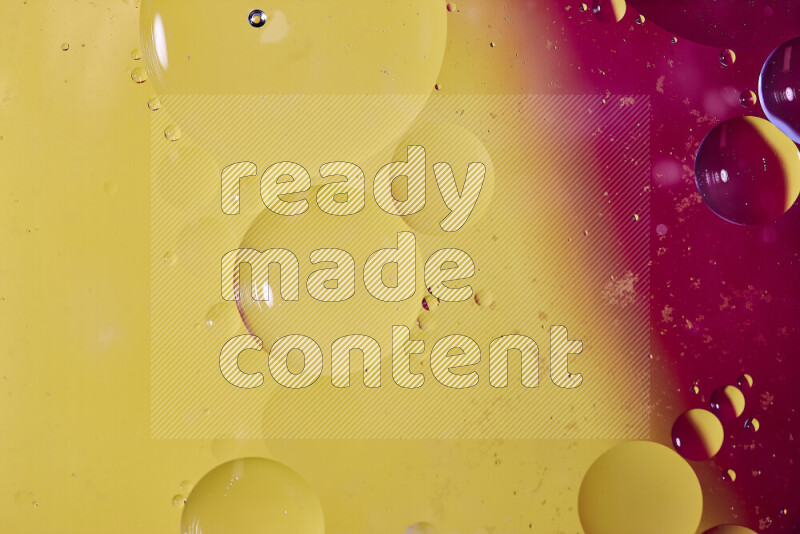 Close-ups of abstract oil bubbles on water surface in shades of red and yellow