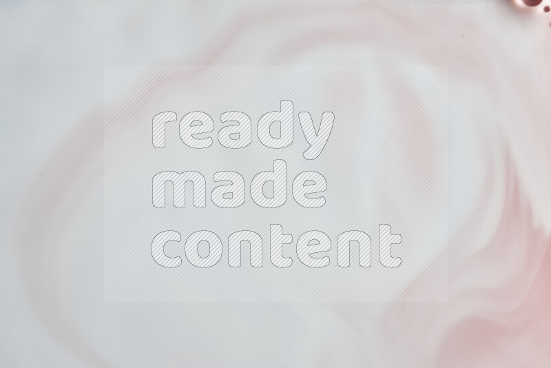 A close-up of abstract swirling patterns in red and white