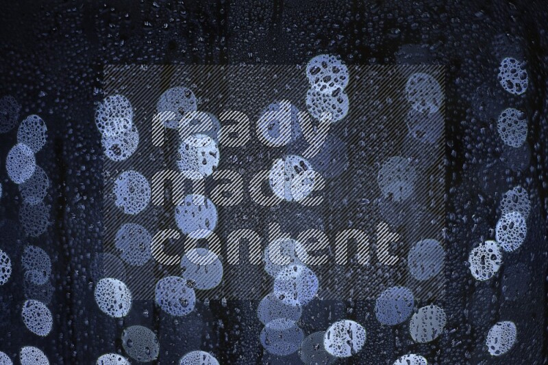 Bokeh light in white with water drops