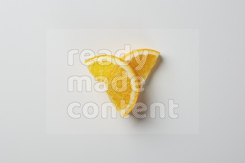 Two halves of an orange slices on white background