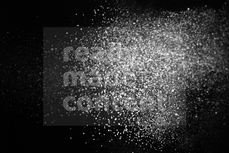 Snow spray on black background