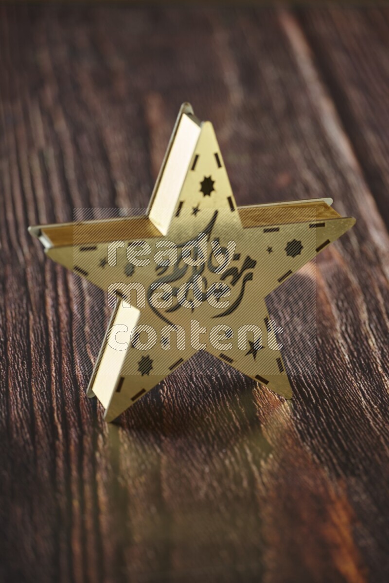 A lantern placed on a wooden background