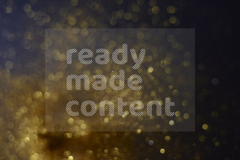 Gold glitter powder isolated on black background