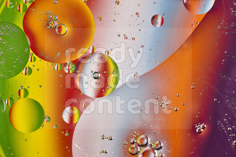 Close-ups of abstract oil bubbles on water surface in multicolors