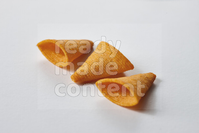 Assorted snacks on white background
