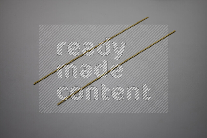 Spaghetti pasta on grey background