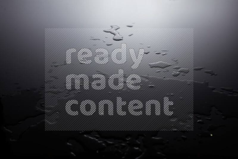 water drops, and droplets on black background