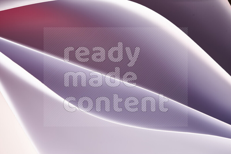 This image showcases an abstract paper art composition with paper curves in white and different warm gradients created by colored light