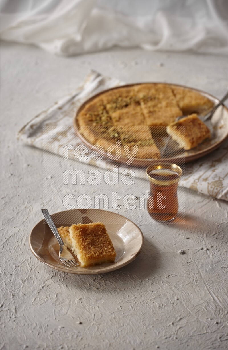 Konafa with tea in a light setup
