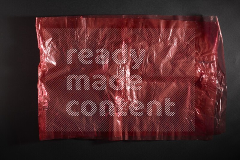 Colored plastic textures on black background