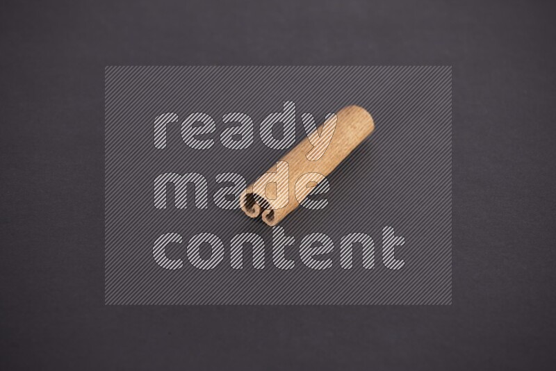 Cinnamon stick on black background