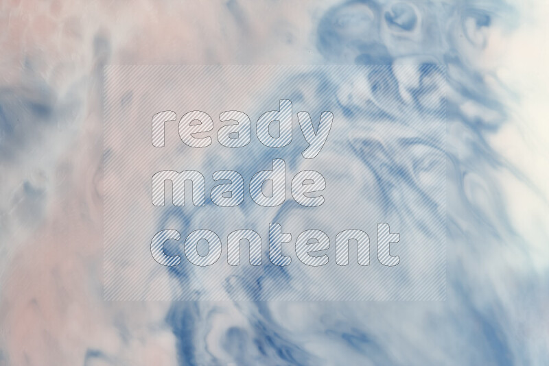 A close-up of abstract swirling patterns in blue, red and white