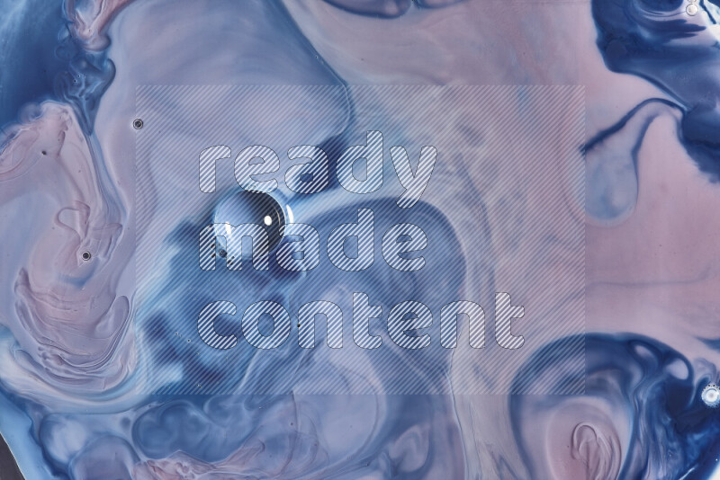 لقطة مقربة لأنماط دوامية باللون الأزرق والأحمر والأبيض