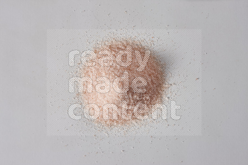 A bunch of fine himalayan salt on white background