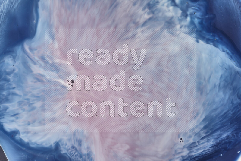 لقطة مقربة لأنماط دوامية باللون الأزرق والأحمر والأبيض