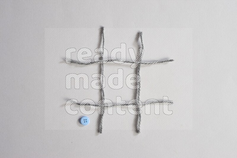 Blue buttons placed on grey background