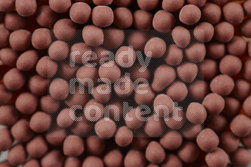 A close-up of a bundle of matches on grey background