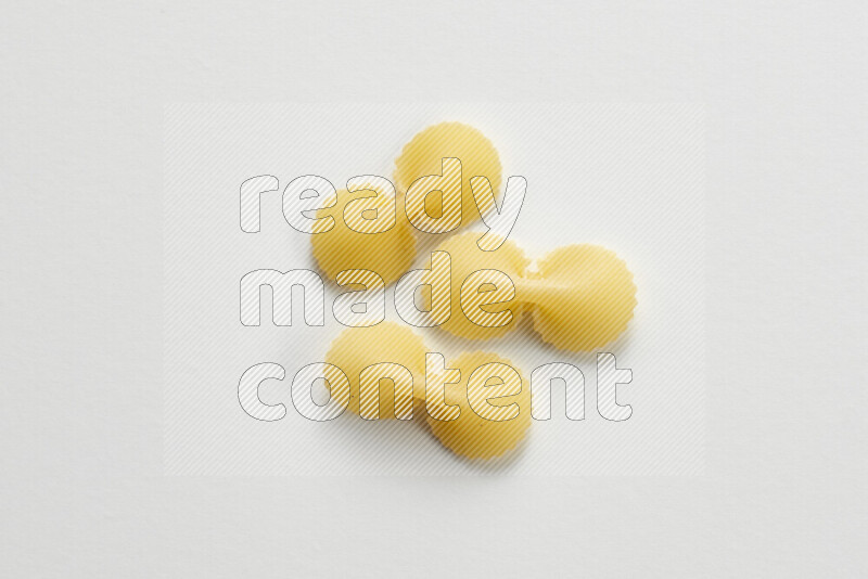 Fiocchi pasta on white background