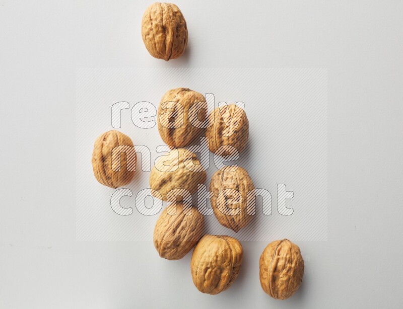 Top-view shot of walnut on white background