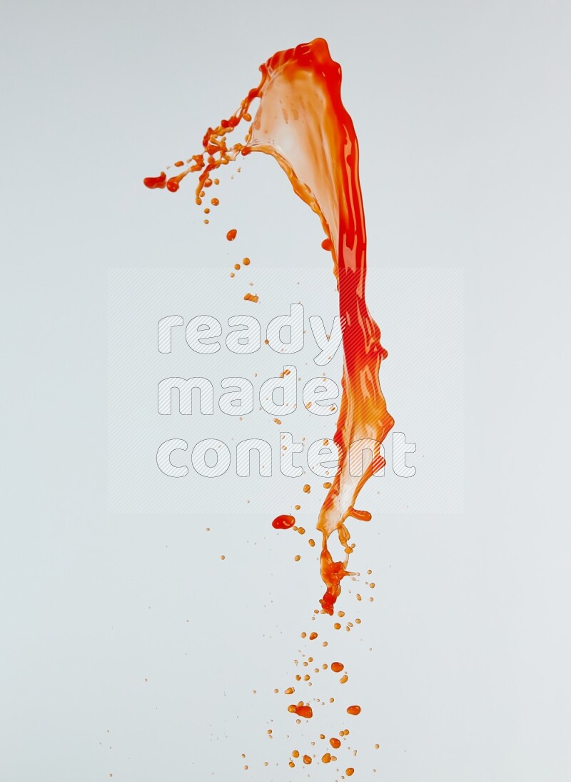 Orange liquid splash and drops on white background