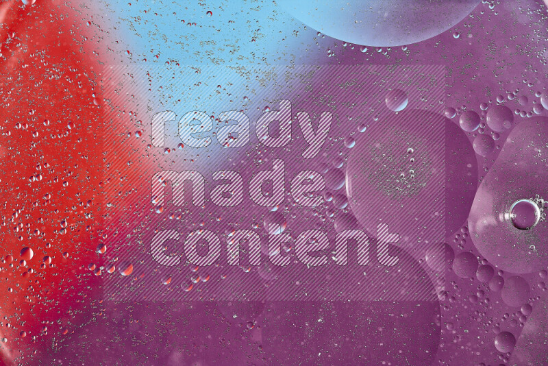 Close-ups of abstract oil bubbles on water surface in shades of blue, red and purple