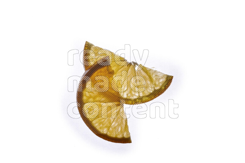 Orange slices on illuminated white background