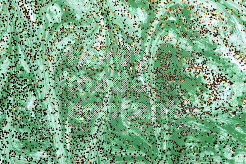 خلفية ملونة مع مزيج من ألوان الطلاء الأخضر والأبيض مع بريق ذهبي متناثر