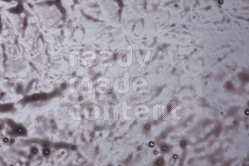 Close-ups of abstract purple paint texture in different shapes