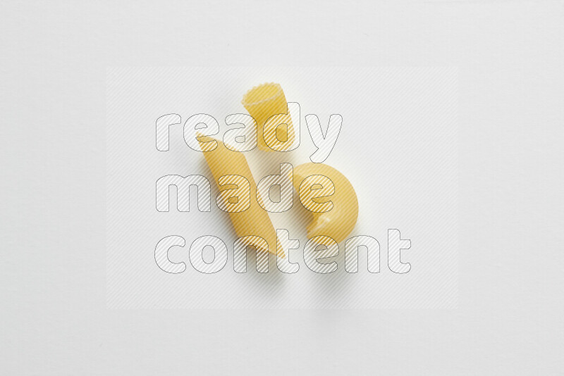 Different pasta types on white background