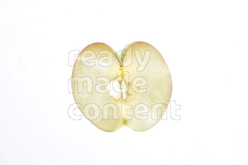 Apple slices on illuminated white background