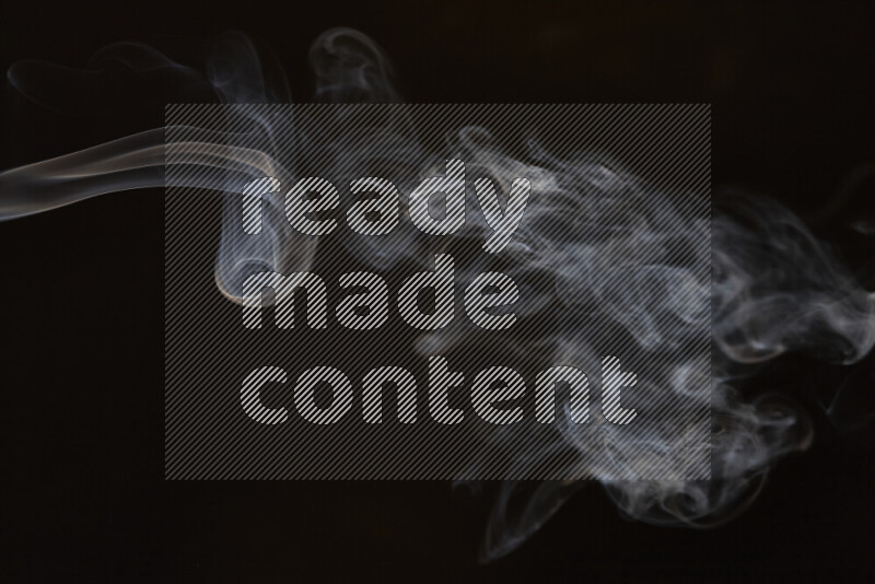 Motion of wavy smoke isolated on dark background