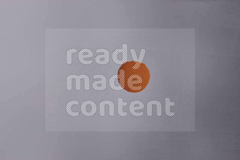 Close-ups of abstract orange paint droplets on the surface