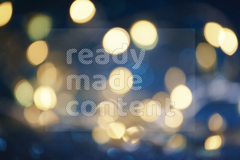 Bokeh light in yellow with blue background