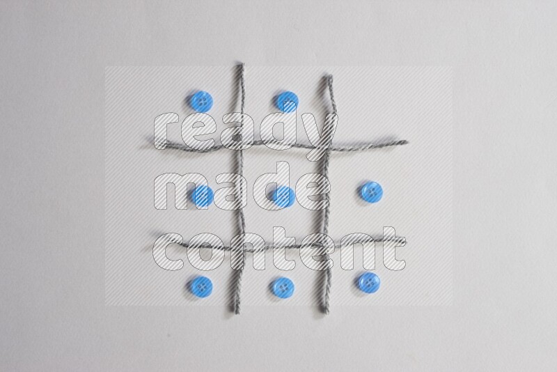 Blue buttons placed on grey background